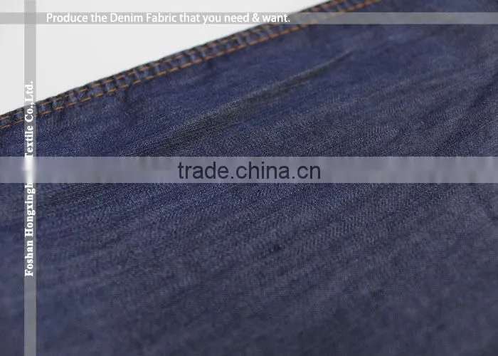 Wholesale large quantity supplier Plain pure 100% Tencel cotton denim fabric for jean garment