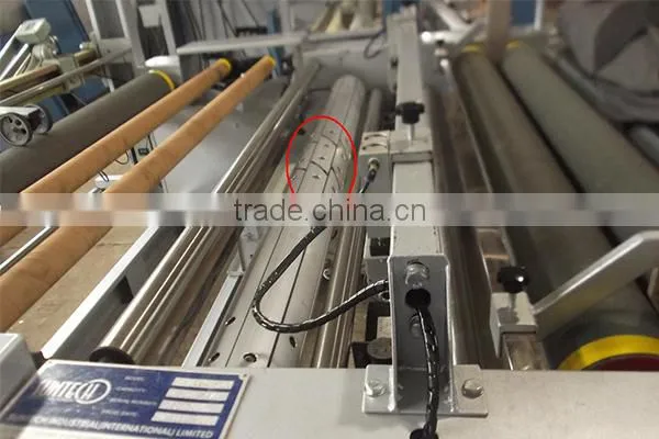 ST-USCM high quality durable Textile Strip Slitting Machine for home textile, Fabric Roll Cutting Machine