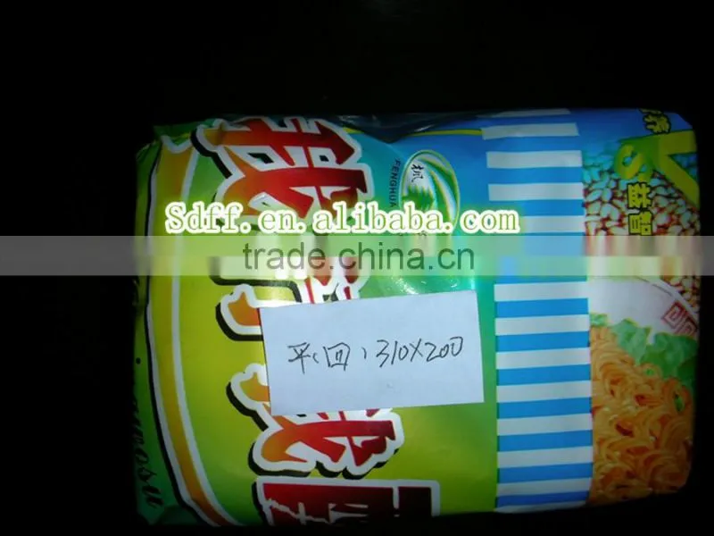 High speed envelope type biscuit packing/wrapping machine