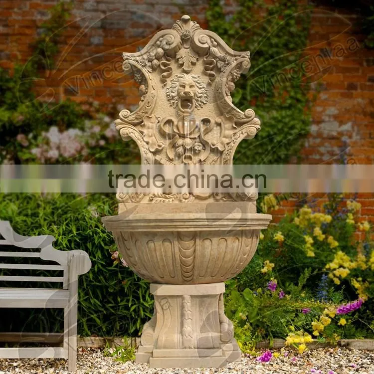 Marble lion head wall fountain