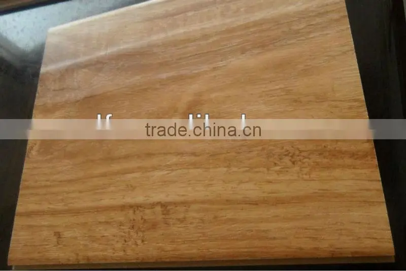 Hand grasps laminated floor