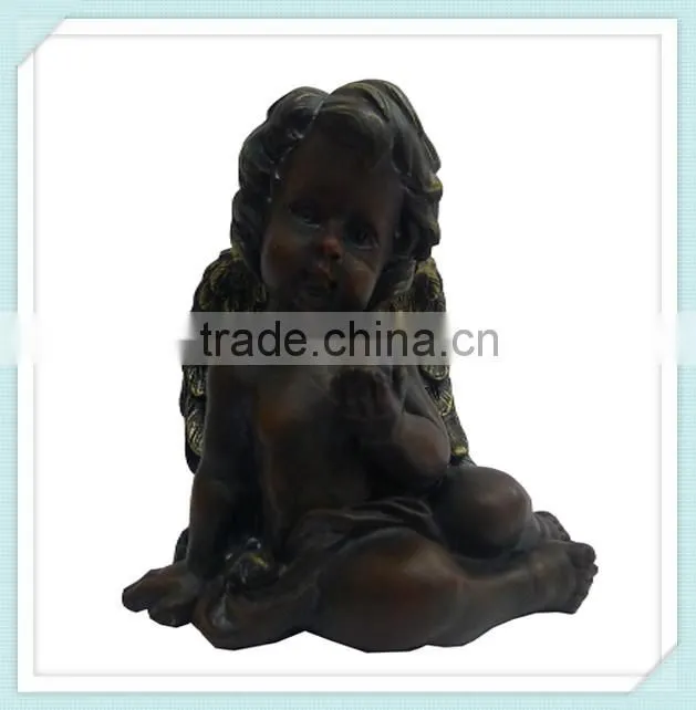 lovely happy angel cute doll holding a heart