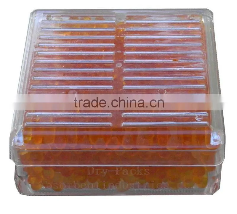 Self indicating silica gel orange desiccant