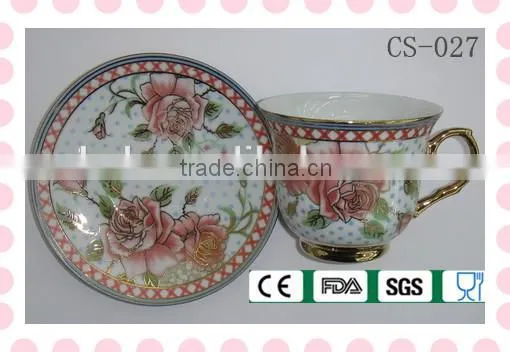 flower tea cup and saucer with gold rim