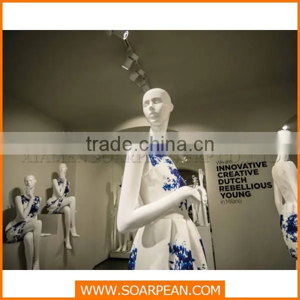 Clothing store window display fiberglass female full body mannequin