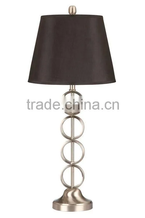 Four ring 32"H table lamp with black shade,brushed steel