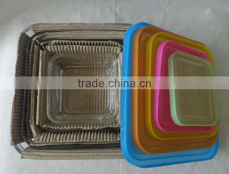 Different sizes glass bowls With mixing lids