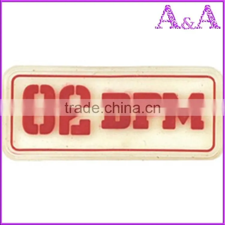 rubber coated jeans metal label