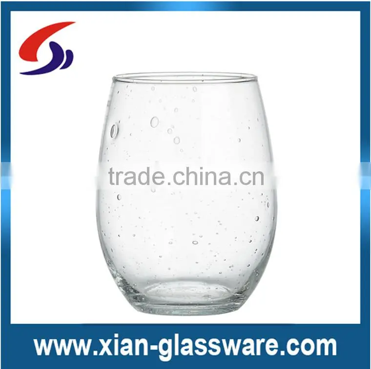 Promotional cheap clear stemless wine glasses with bubbles for wholesale/wine glass cup