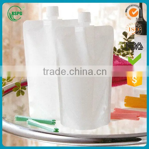 Laundry detergent spout pouch