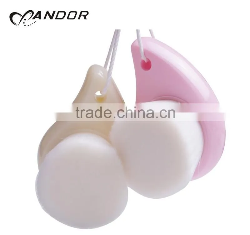 Patent design pink handle andor face cleansing brush
