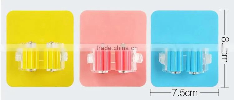 Wholesale Stock Magic Wall Suction Plastic Mop Handle Storage Holder