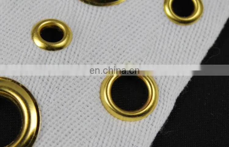 Gold eyelet style lace trim for decorative
