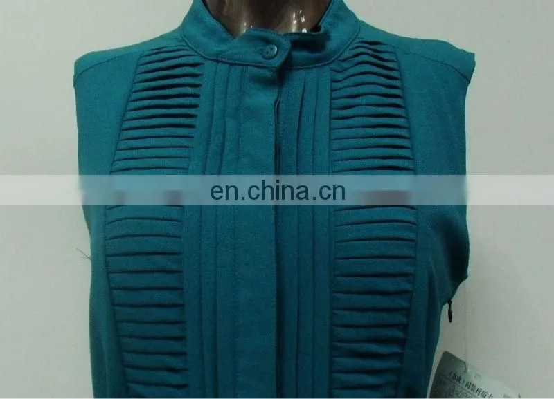 Woman's classic pleated front button open shirt dress made of chiffon crepe
