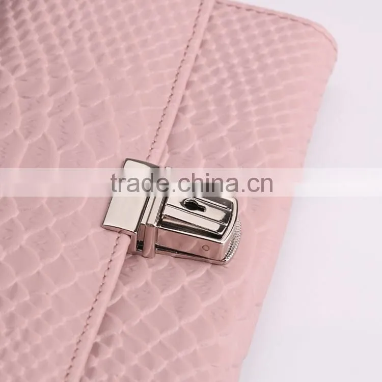 Embossed snake pattern in second grain tough leather wallet with lock