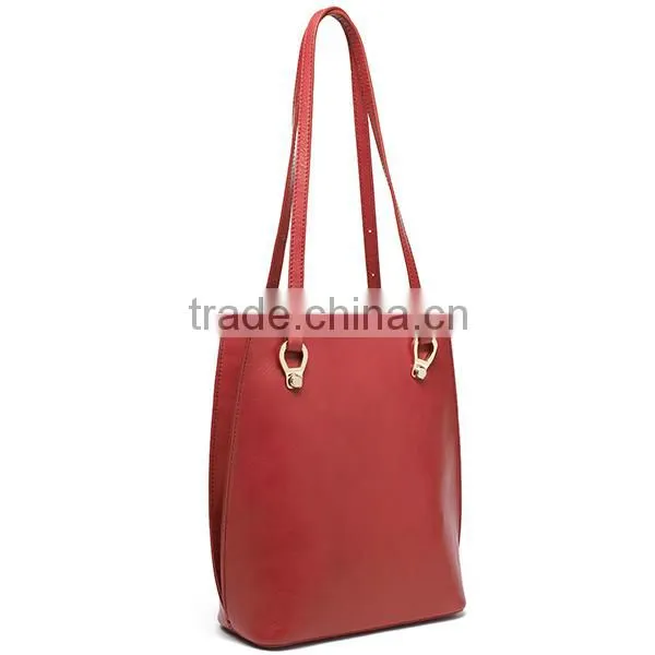 Multipurpose leather bag convert to a backpack from a shoulder bag