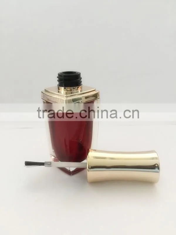 Red painted nail polish bottle with UV cap and shoulders