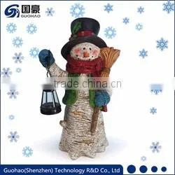 Regal Santa statue and Sledding Santa Figurine