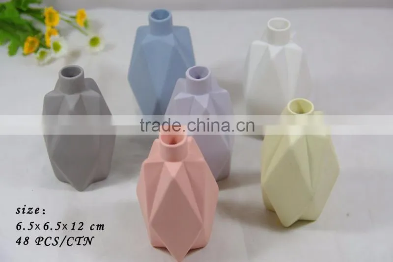 Small ceramic origami flower vase