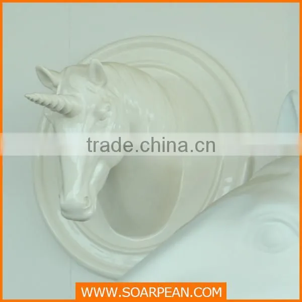 golden fiberglass horse head sculpture