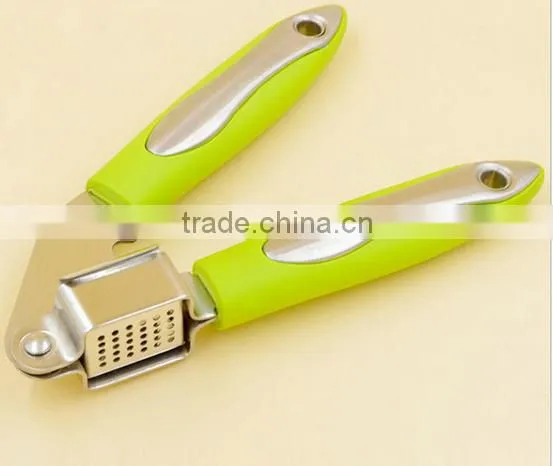 Hot Sale Kitchen Gadget stainless steel garlic Crushes with PP protective handle