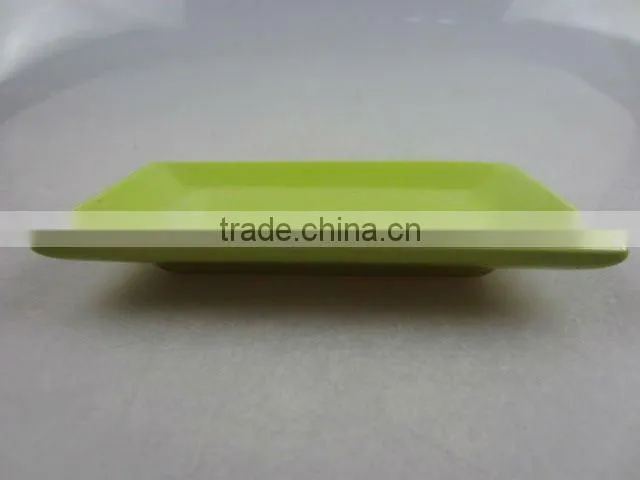Stock glazed porcelain rectangle sauce dish