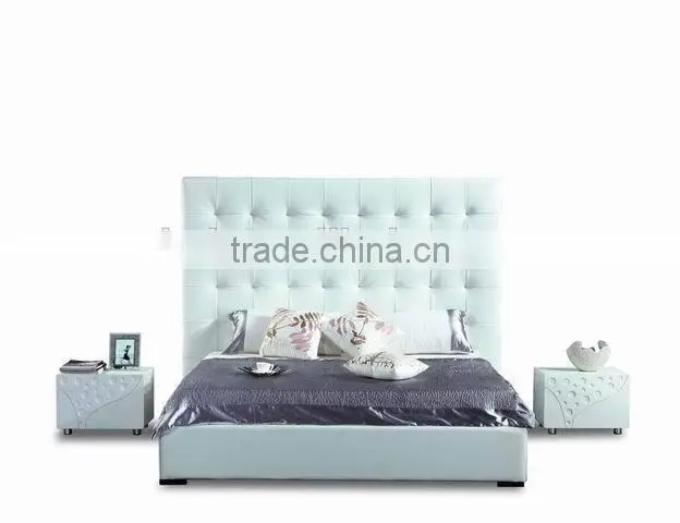 Luxury white leather bed with high headboard