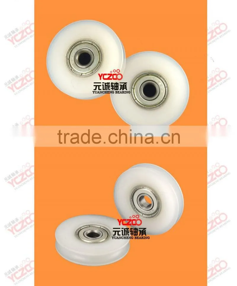 Low friction gate door roller with nylon