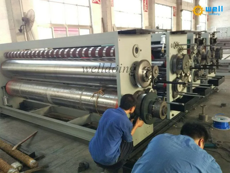 Hi-speed printer slotter die cutter with stacker machine