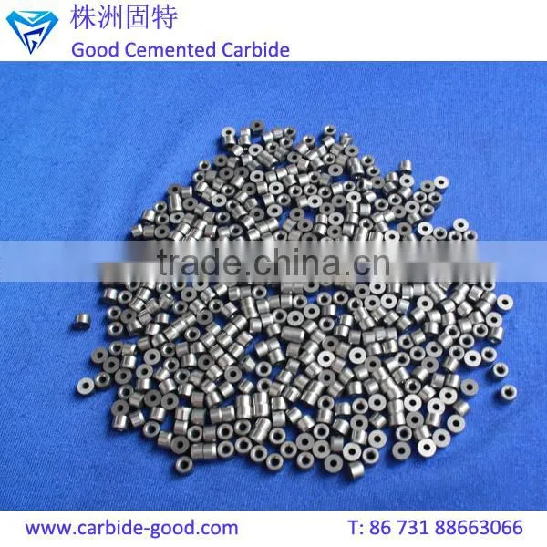 Discharge valve seat made from tungsten carbide