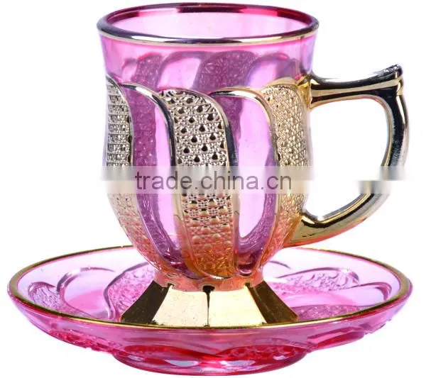 Golden tea cup and saucer set