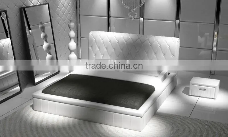 Luxury white leather bed with high headboard