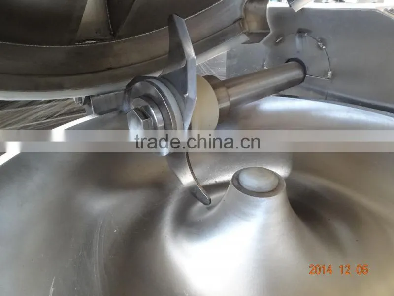 Meat cutting and blending machine