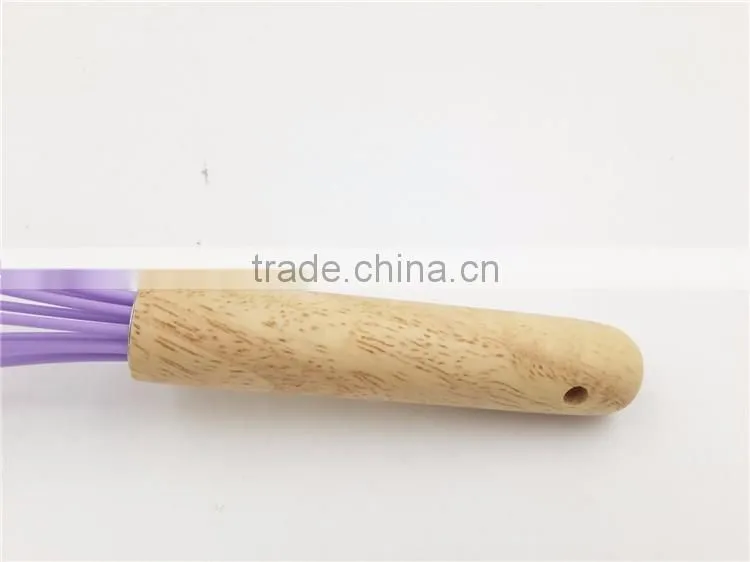 Wooden egg whisk