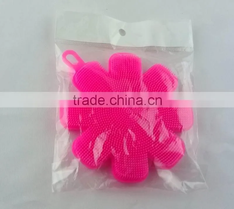 Pink silicone face washing brush for household usage