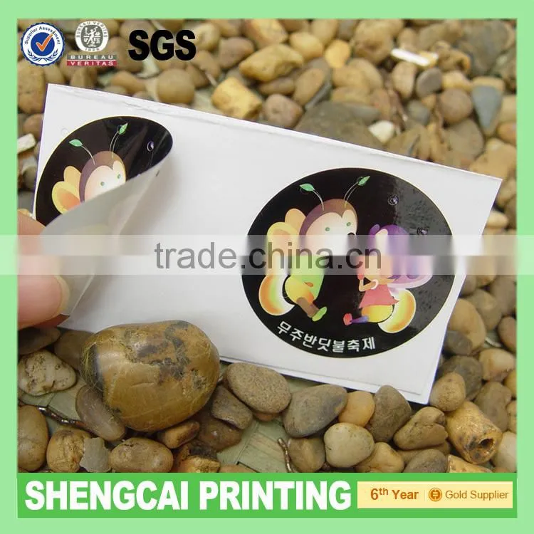 Different material adhesive label