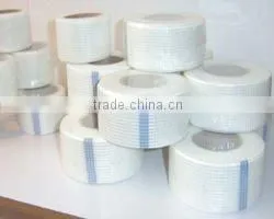 Self-adhesive fiberglass fabrics for skim coating over the plate of joints and cracks