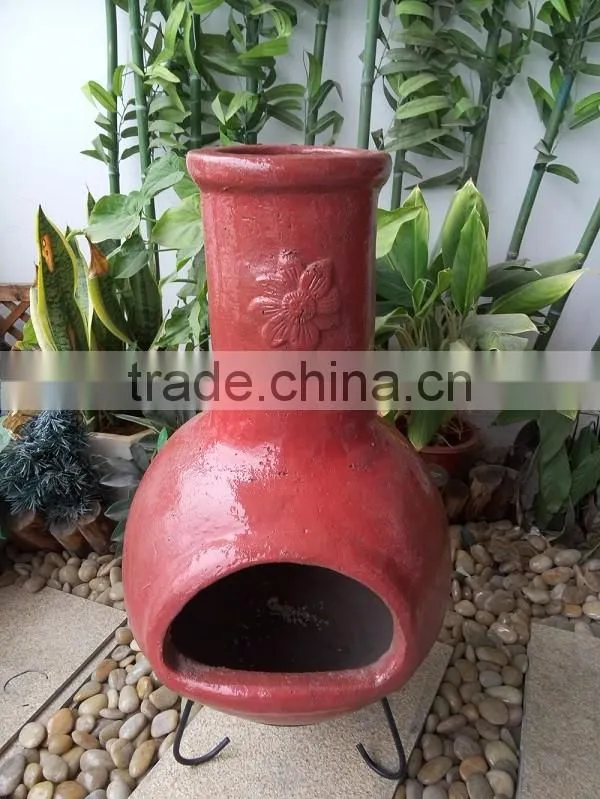 Sun Mexican clay chimenea in red