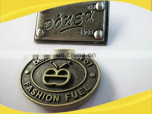 custom metal label for handbags,garment leather label,custom metal leather label