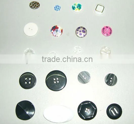 Plastic buttons for shirts and garments