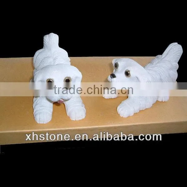 A lovely little white stone dog statue