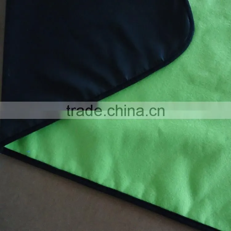 green color polar fleece with sponge & nylon back outdoor waterproof travel blanket