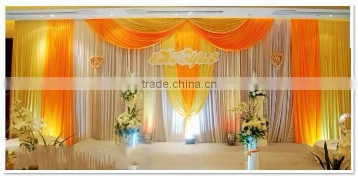 fancy and elegant pipe and drape wedding backdrop
