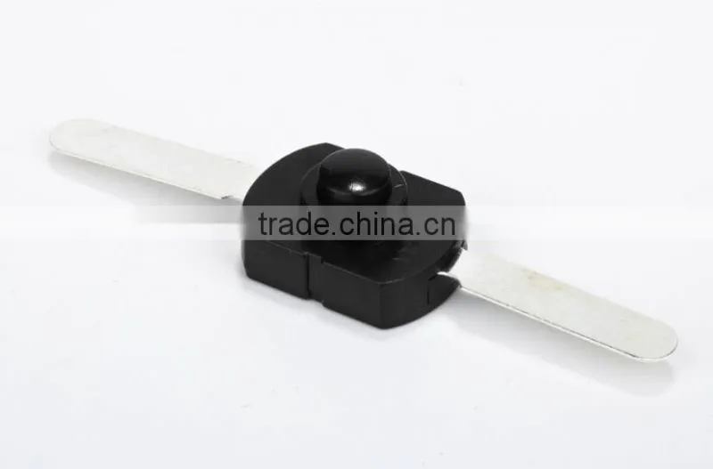 Flashlight push button switch with black plastic materials