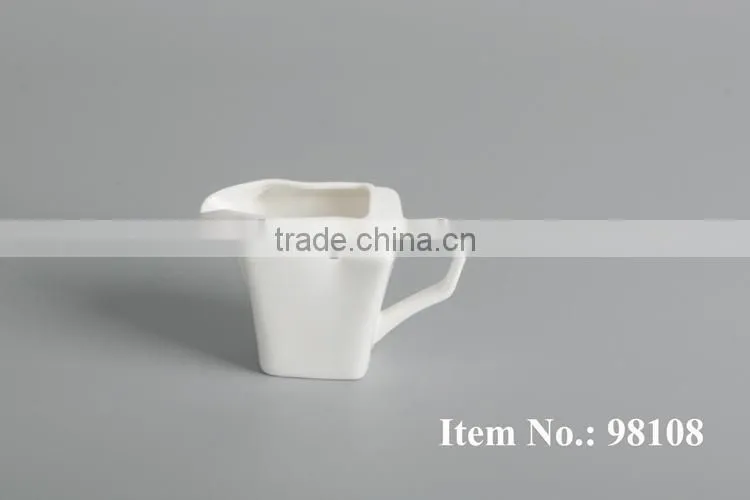 white ceramic drinkware milk creamer