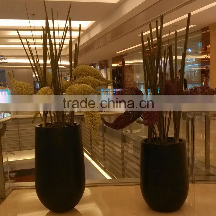 Black round fiberglass flowerpot