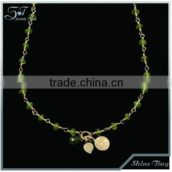 luxurious chain necklace with red gemstone charm pendant