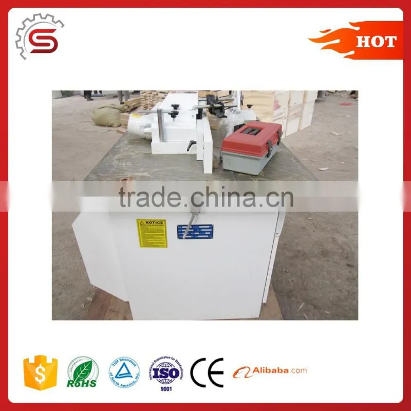 Woodworking spindle moulder with tilt spindle