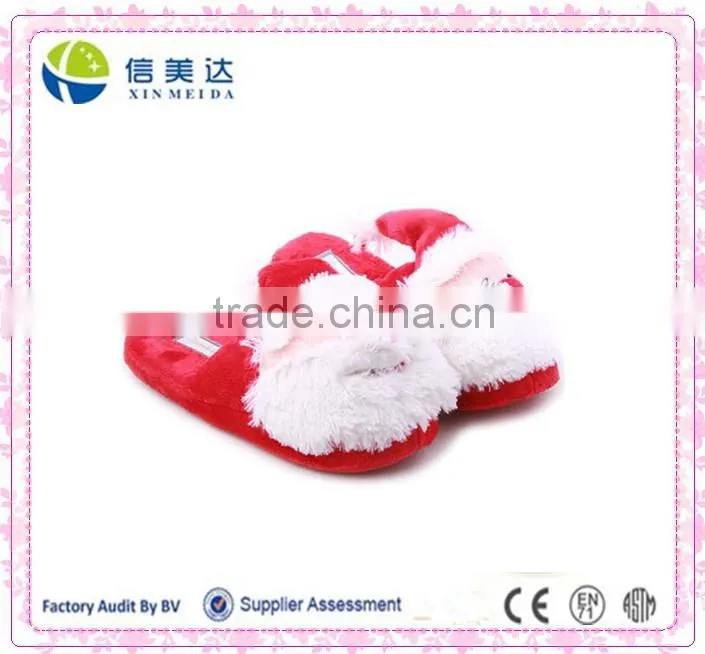 Lovely indoor room hotel slipper with the head of Father Christmas
