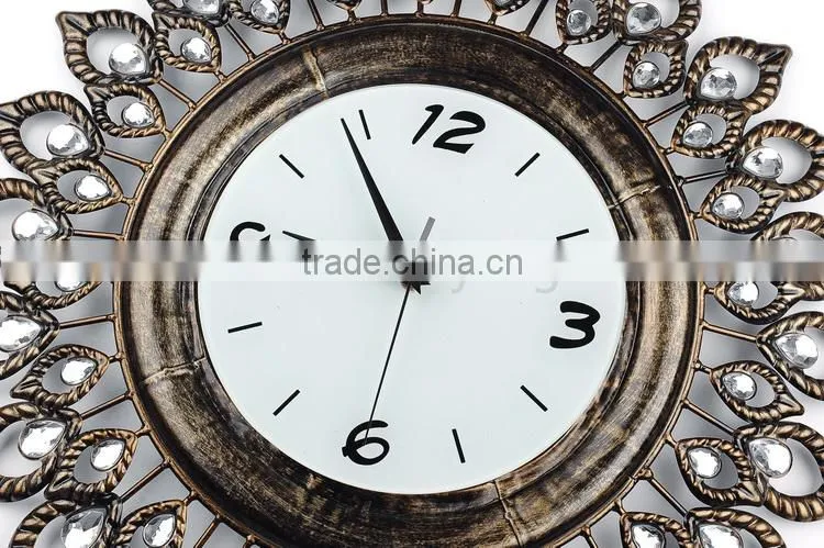 Vintage gold metal wall clock with eye shape